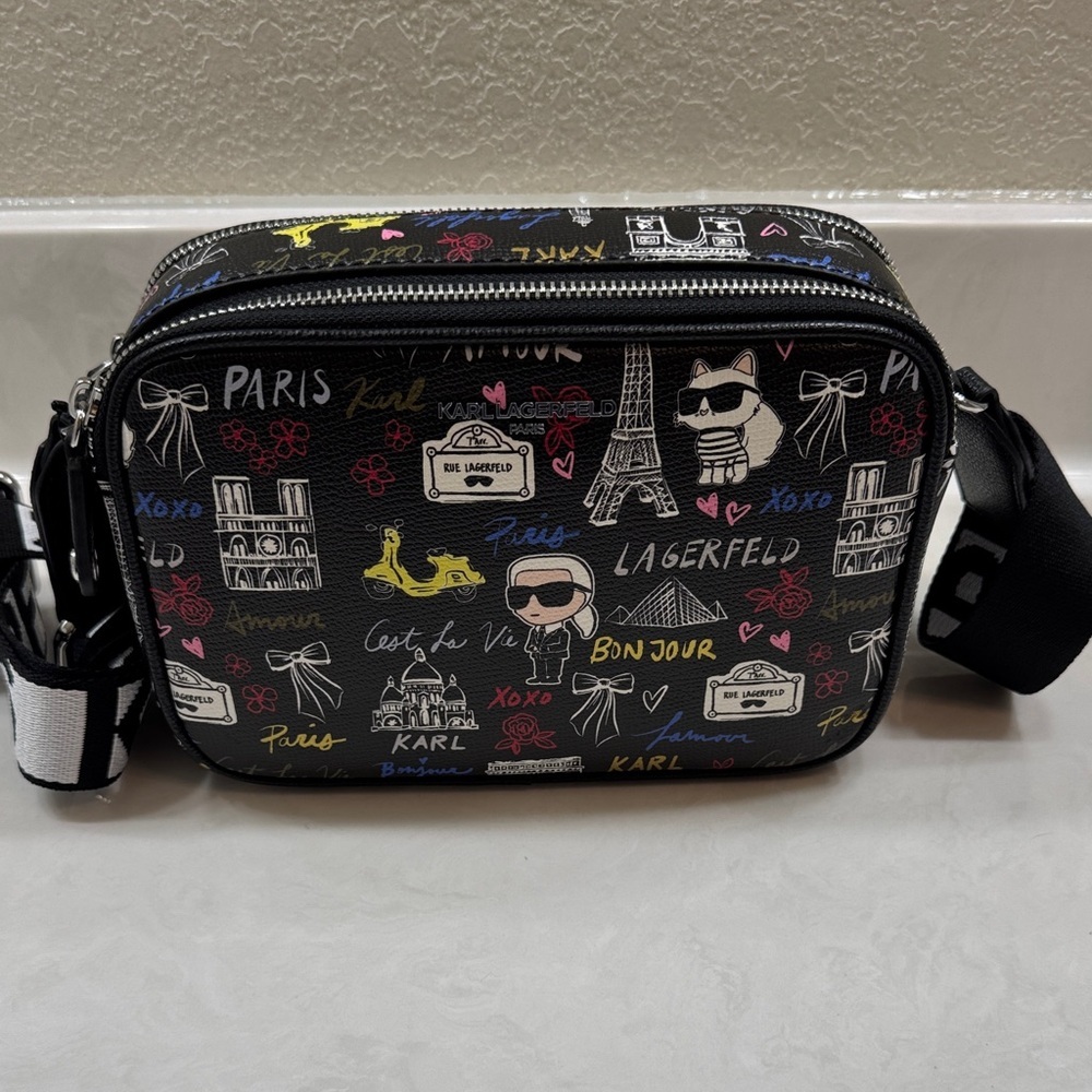 Karl Lagerfeld Black Graphic Crossbody Bag with Guitar Strap. Double Zipper